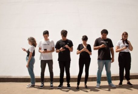 Smartphone - group of people standing on brown floor