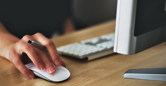 Computer - Person Holding Apple Magic Mouse