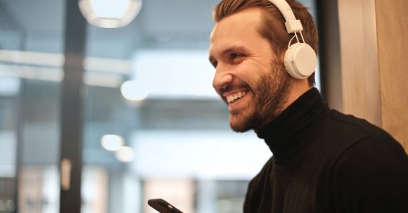 Headphones - Man Wearing White Headphones Listening to Music