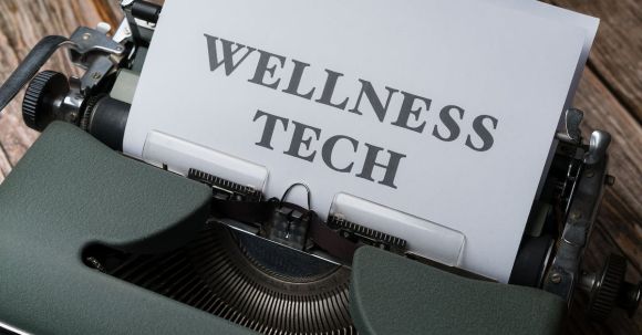 Mental Health Apps - A typewriter with the word wellness tech on it