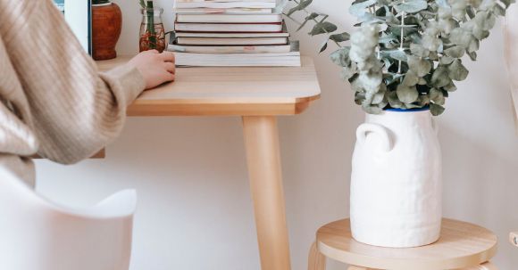 Smart Home Devices - Anonymous woman working on laptop in room