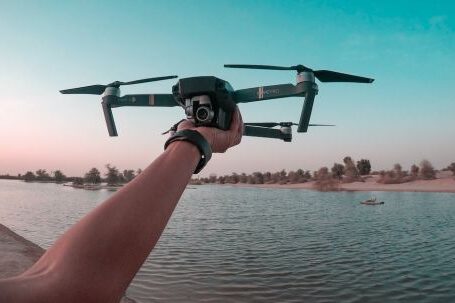 Drones - Photo of a Person Holding a Drone