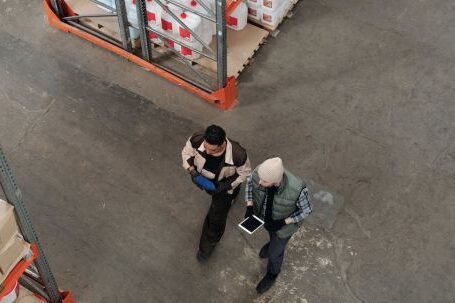 Tablet Storage - Men Working in a Warehouse