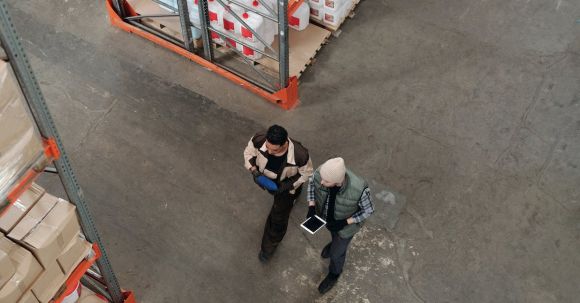 Tablet Storage - Men Working in a Warehouse