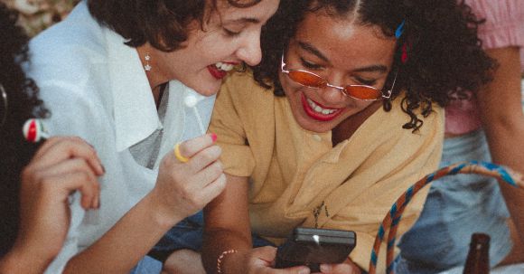 Gaming PCs - Shallow Focus Photo of Woman Using Game boy