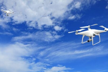 Drones - 2 Quadcopter Under Blue Sky and White Clouds