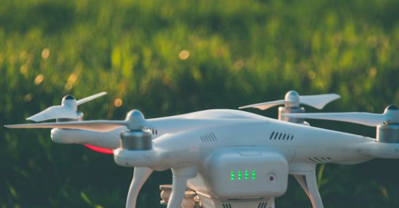 Drones - White and Gray Quadcopter on Ground