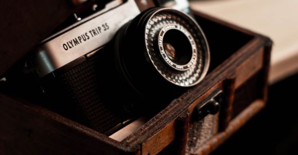 Compact Cameras - Retro photo camera in classic chest