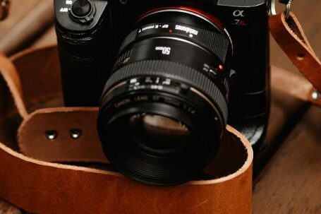 Mirrorless Cameras - Black Camera With Brown Leather Strap